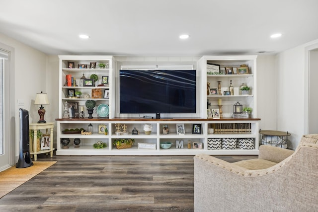 living room with dark hardwood / wood-style flooring