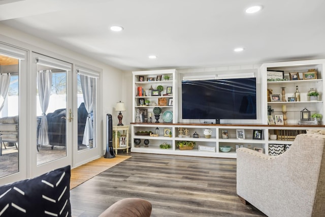 living room with french doors and dark hardwood / wood-style floors