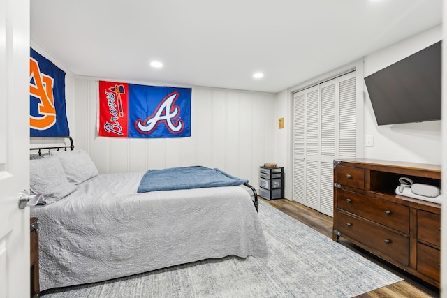 bedroom featuring a closet and hardwood / wood-style floors