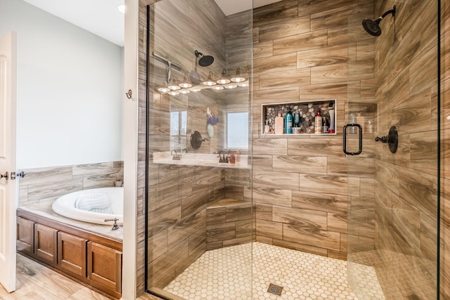 bathroom featuring plus walk in shower