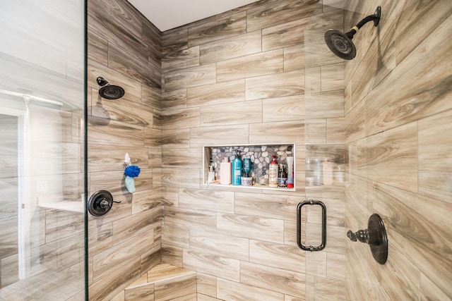 bathroom featuring an enclosed shower