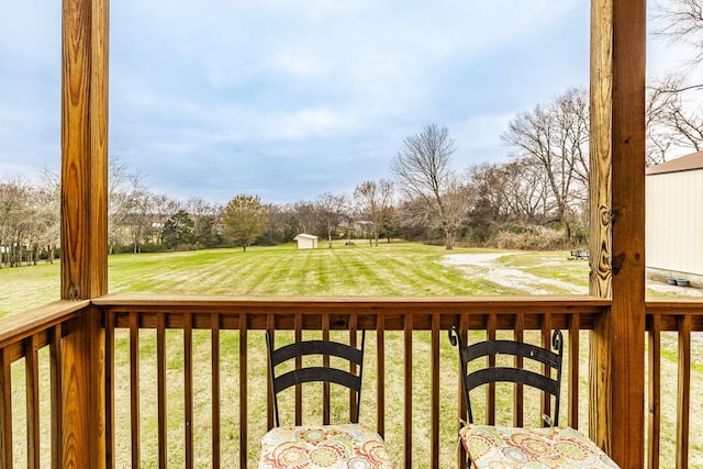 deck featuring a lawn