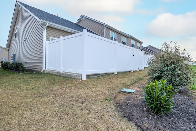 view of property exterior featuring a yard