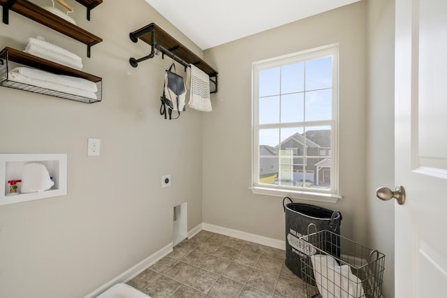 laundry room featuring electric dryer hookup, light tile patterned floors, and washer hookup