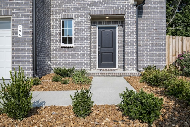 property entrance featuring a garage