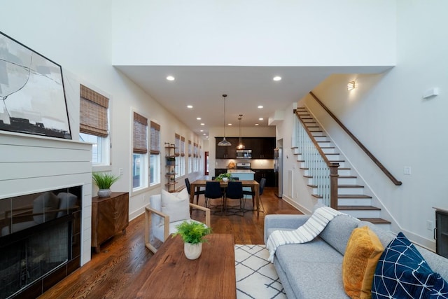 living room featuring dark hardwood / wood-style floors