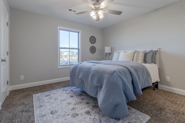 bedroom with ceiling fan and carpet floors