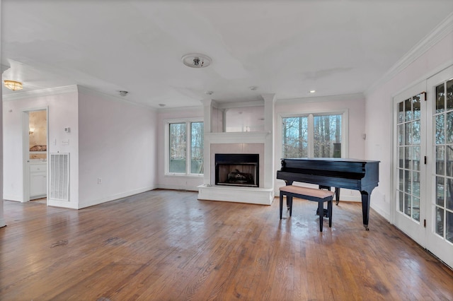 misc room featuring dark hardwood / wood-style floors and crown molding