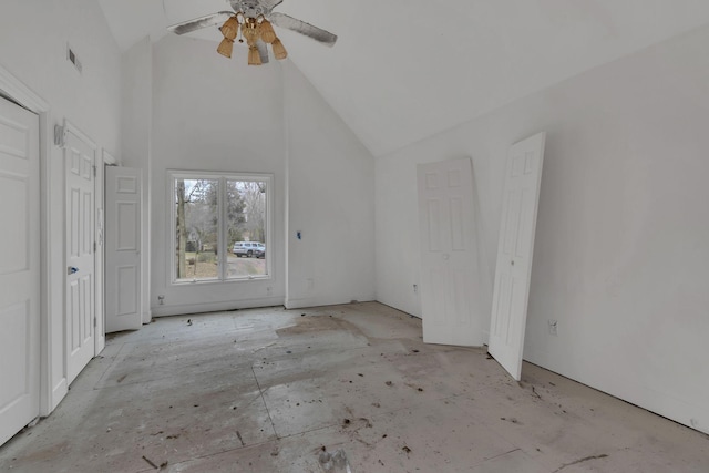 interior space with high vaulted ceiling and ceiling fan