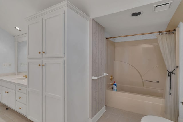 full bathroom featuring tile patterned floors, shower / bath combination with curtain, toilet, and vanity