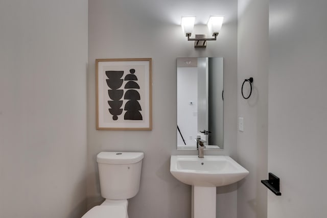 bathroom featuring toilet