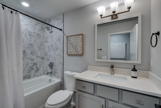 full bathroom featuring vanity, toilet, and shower / bathtub combination with curtain