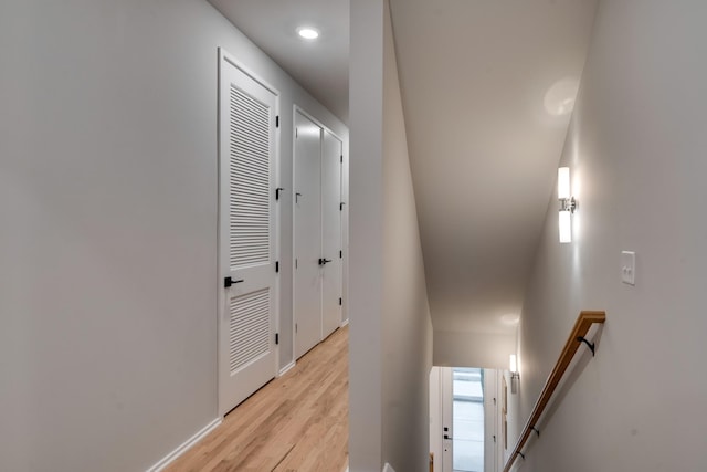 hall with light wood-type flooring