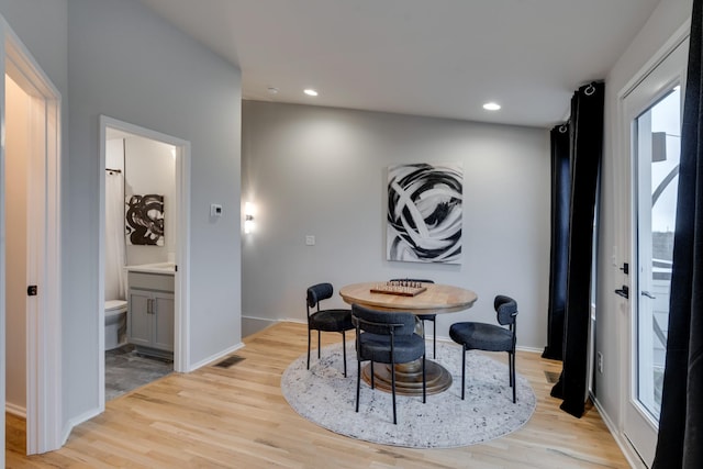 dining area featuring light hardwood / wood-style flooring