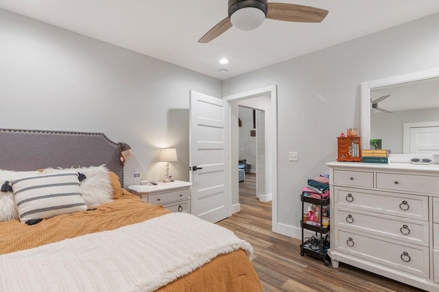 bedroom featuring hardwood / wood-style floors and ceiling fan