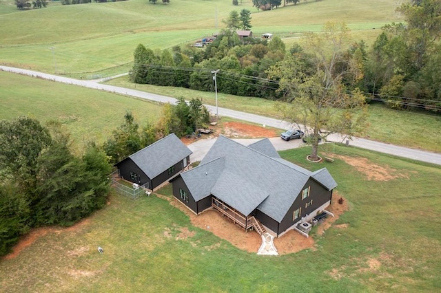 birds eye view of property featuring a rural view