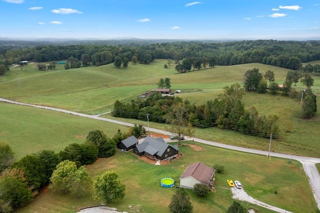 birds eye view of property featuring a rural view