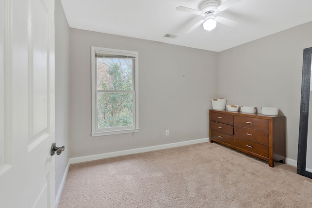 bedroom featuring ceiling fan and light colored carpet