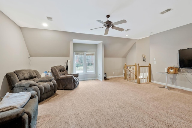 living room with light carpet, ceiling fan, and lofted ceiling