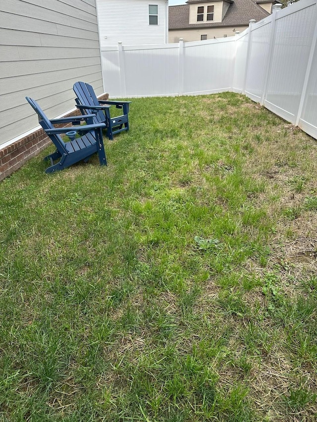 view of yard featuring fence private yard