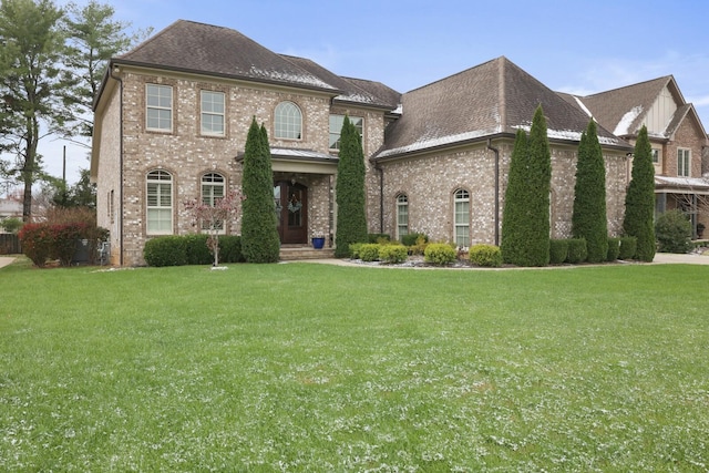 view of front of house with a front lawn