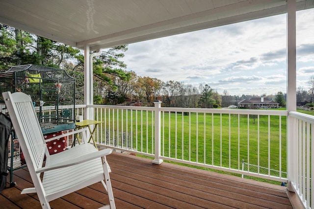 deck featuring a lawn