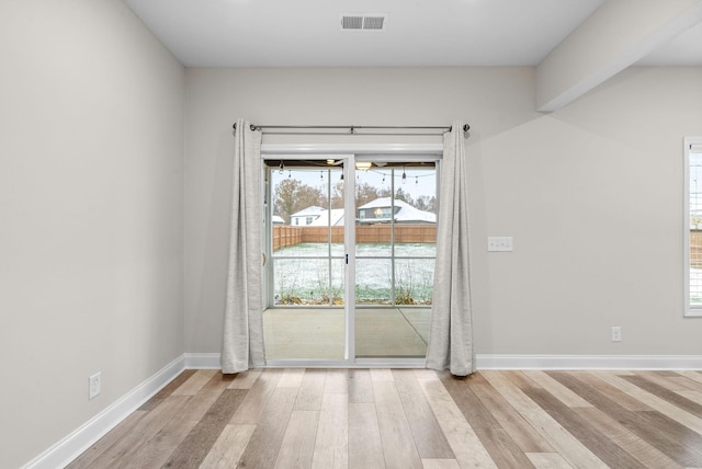 unfurnished dining area with light hardwood / wood-style floors