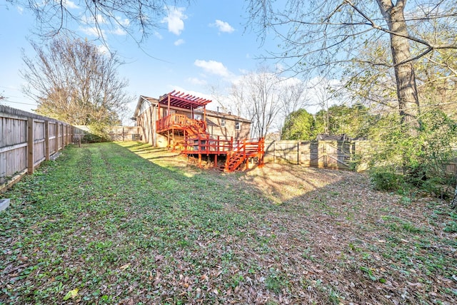 view of yard featuring a wooden deck