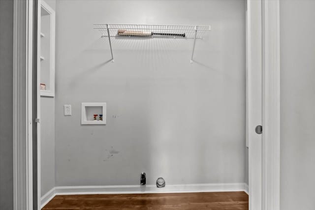 laundry area featuring hookup for a washing machine, gas dryer hookup, and hardwood / wood-style floors