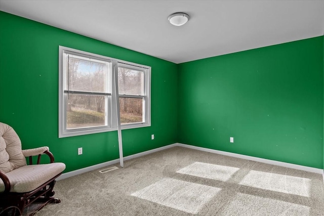 spare room with carpet flooring