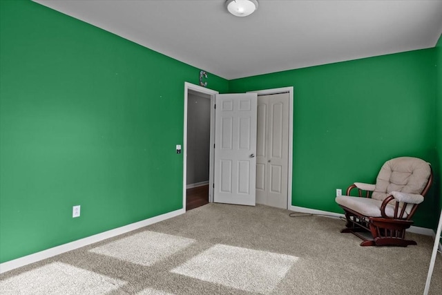 unfurnished room featuring carpet flooring