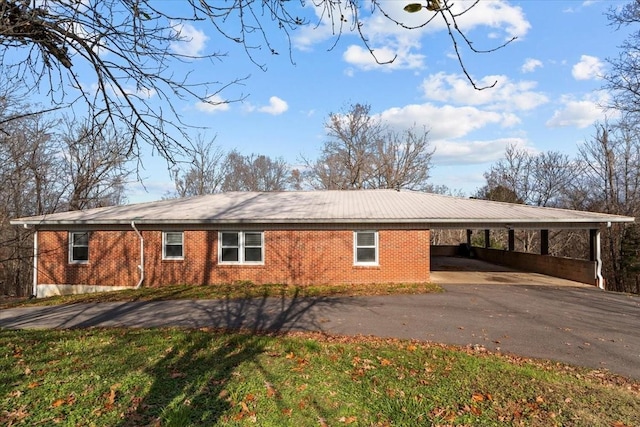 exterior space featuring a carport