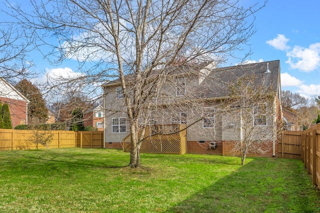 view of yard with a wooden deck