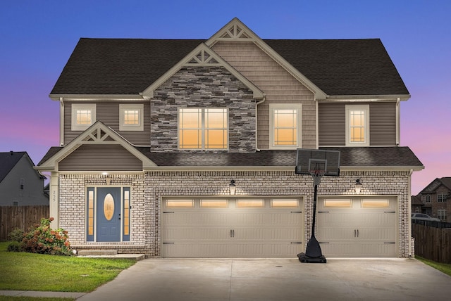 view of front of property featuring a garage