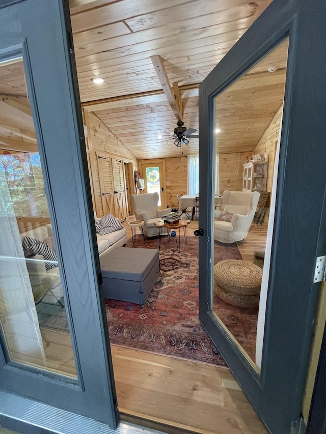 entryway featuring hardwood / wood-style floors, vaulted ceiling, and wooden ceiling