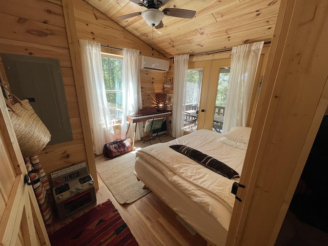 bedroom featuring access to exterior, ceiling fan, an AC wall unit, wood walls, and lofted ceiling