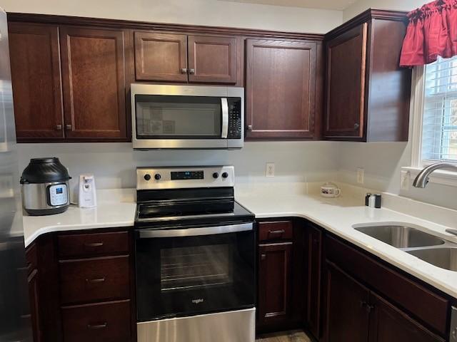 kitchen with stainless steel appliances and sink