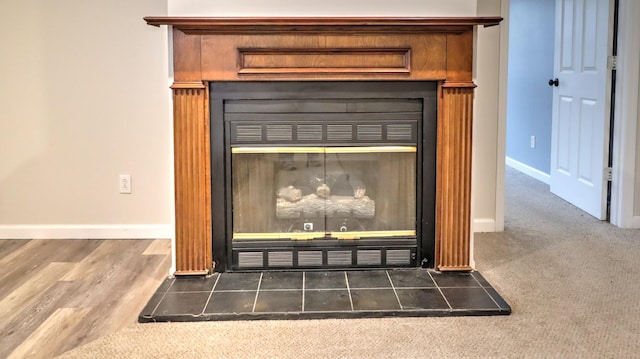 details with a fireplace and hardwood / wood-style floors