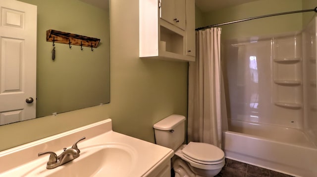 full bathroom featuring tile patterned flooring, vanity, toilet, and shower / bath combo with shower curtain