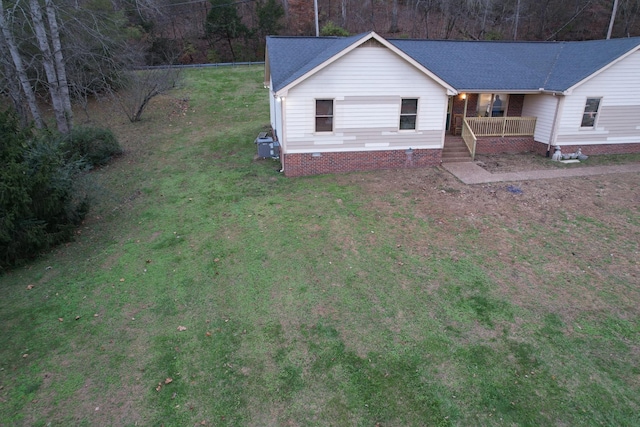 view of front of house with a front lawn and a porch