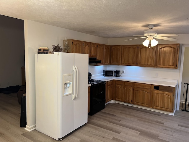 kitchen with ceiling fan, light wood-type flooring, black range with electric cooktop, and white refrigerator with ice dispenser