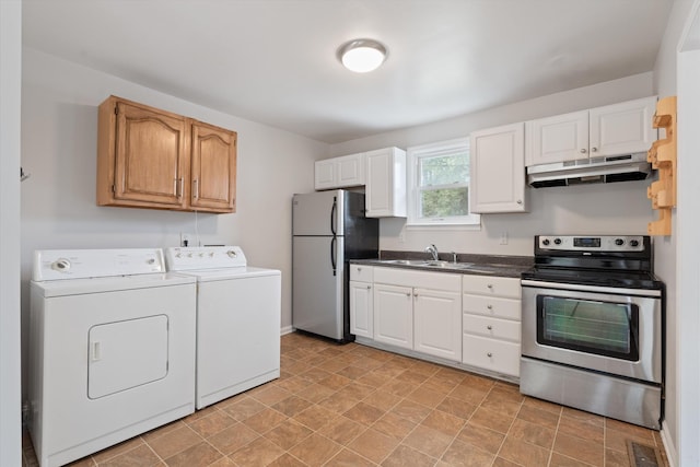 kitchen with white cabinetry, separate washer and dryer, sink, and appliances with stainless steel finishes