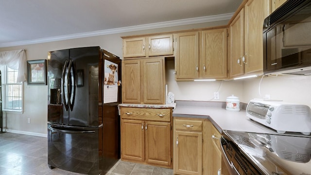 kitchen featuring crown molding and black appliances