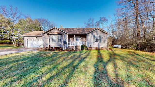 ranch-style house featuring a garage, covered porch, and a front lawn