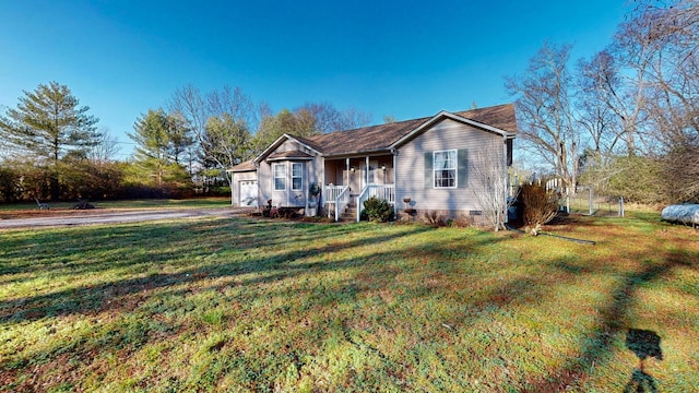 ranch-style house featuring a front yard and a porch