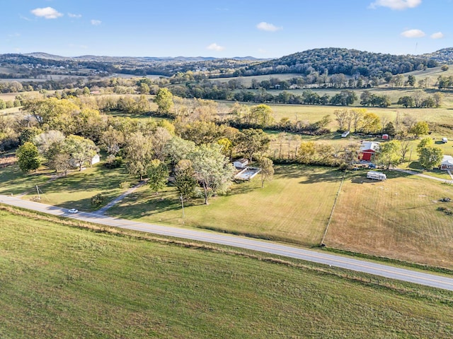 bird's eye view with a mountain view and a rural view