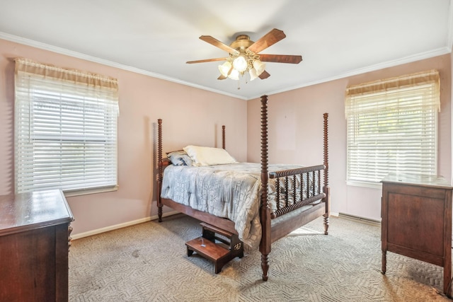 carpeted bedroom featuring ceiling fan and ornamental molding