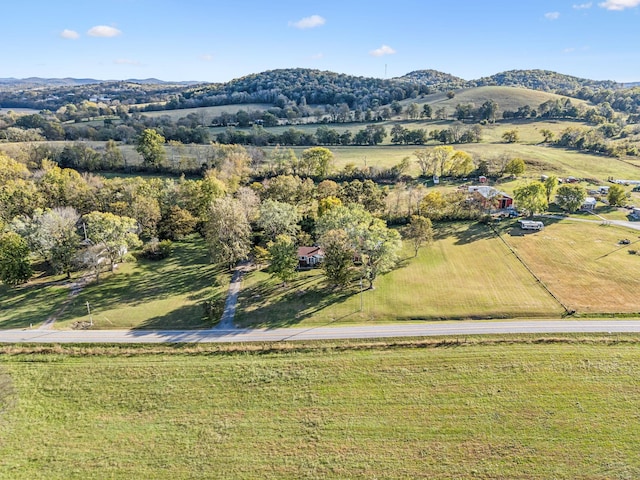 aerial view with a mountain view and a rural view