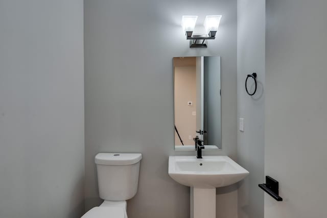 bathroom featuring toilet