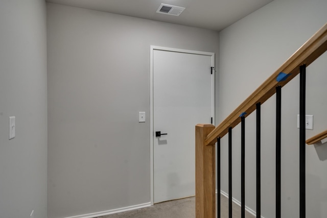 view of carpeted entrance foyer